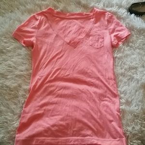 Bright light orange shirt with pocket