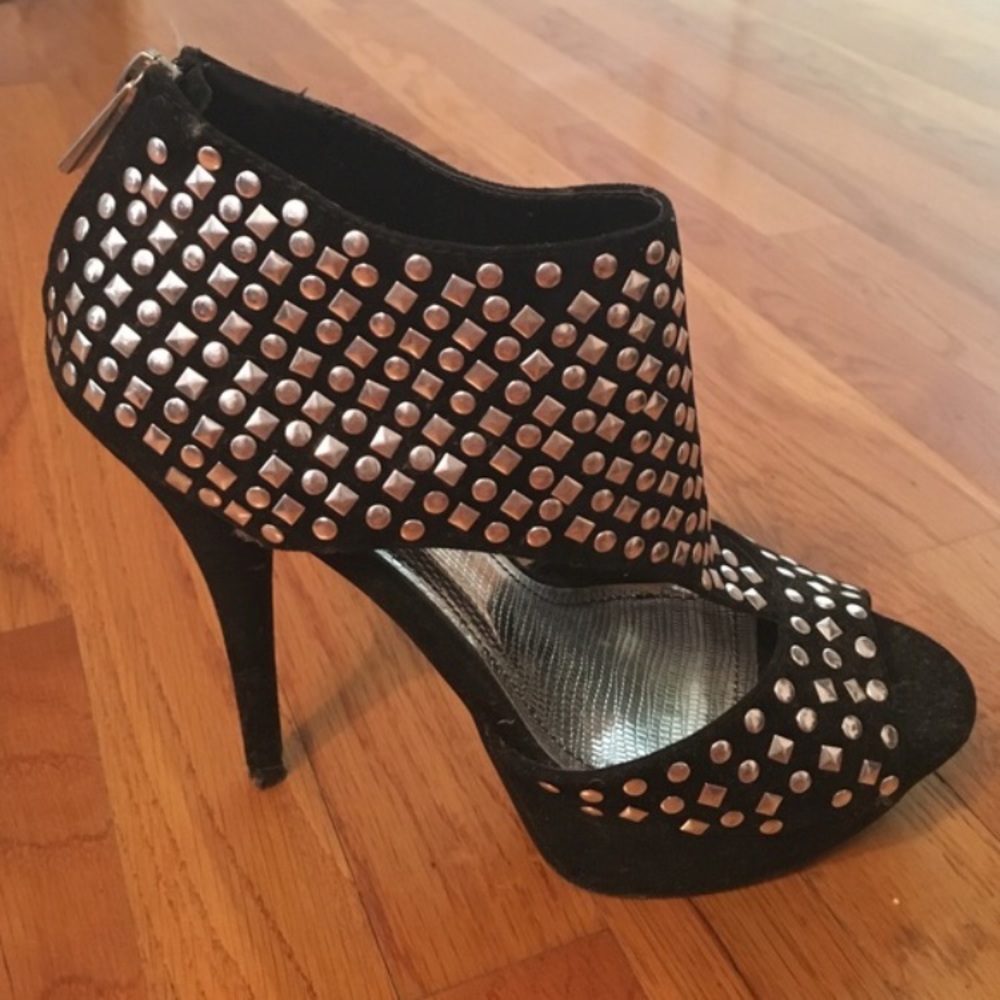 Black silver-studded heels by Anne Michelle