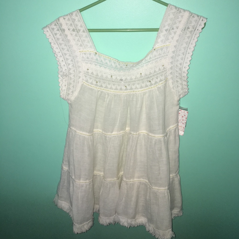 Free people top! Beautiful semi sheer shirt!