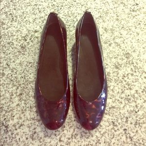 Stuart Weitzman tortoise shell patent wedge