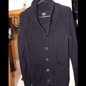 Black cardigan with vertical stitched design