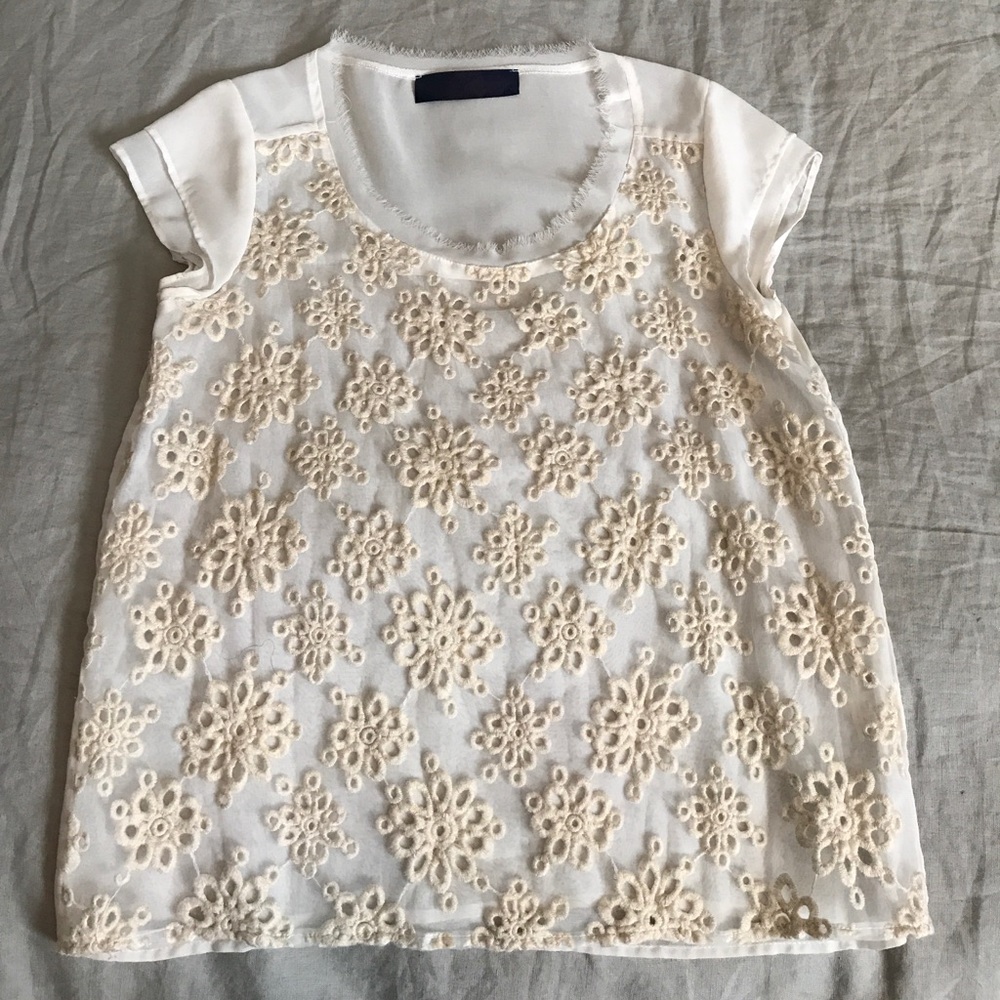White blouse with gold floral detail