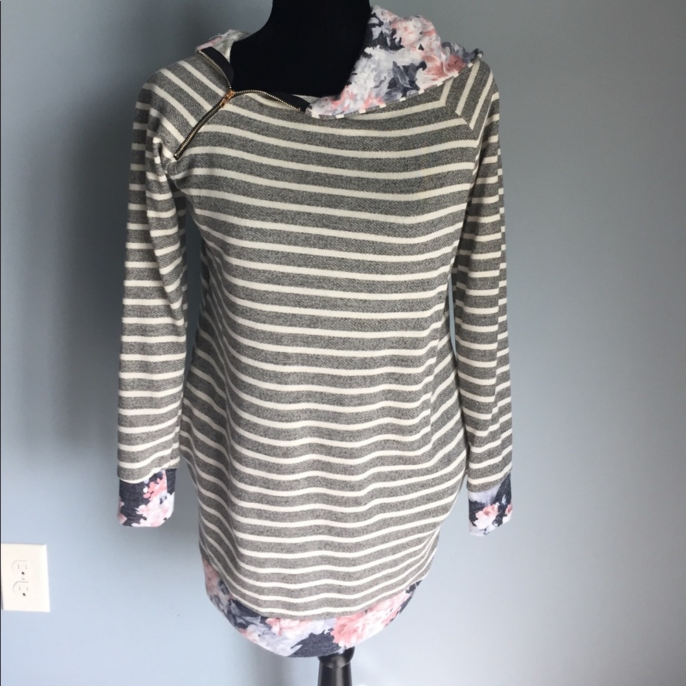 Long sleeved tunic with a hood