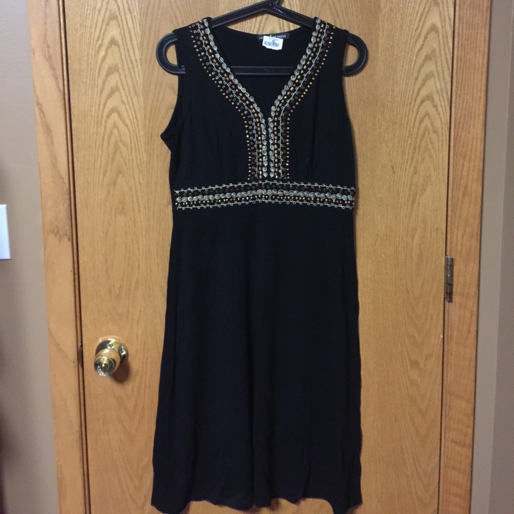 Brand new black dress with cute beads design