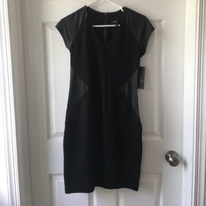 Black Mossimo dress with leather details.