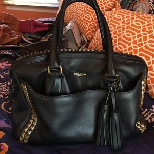 Black leather coach bag with studs