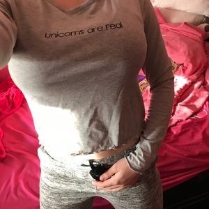 A, "unicorns are real." H & M long sleeved shirt.