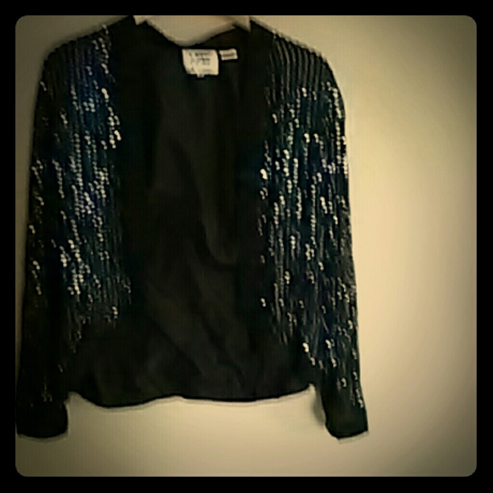 Bead and sequins, black with lining. Beautiful.