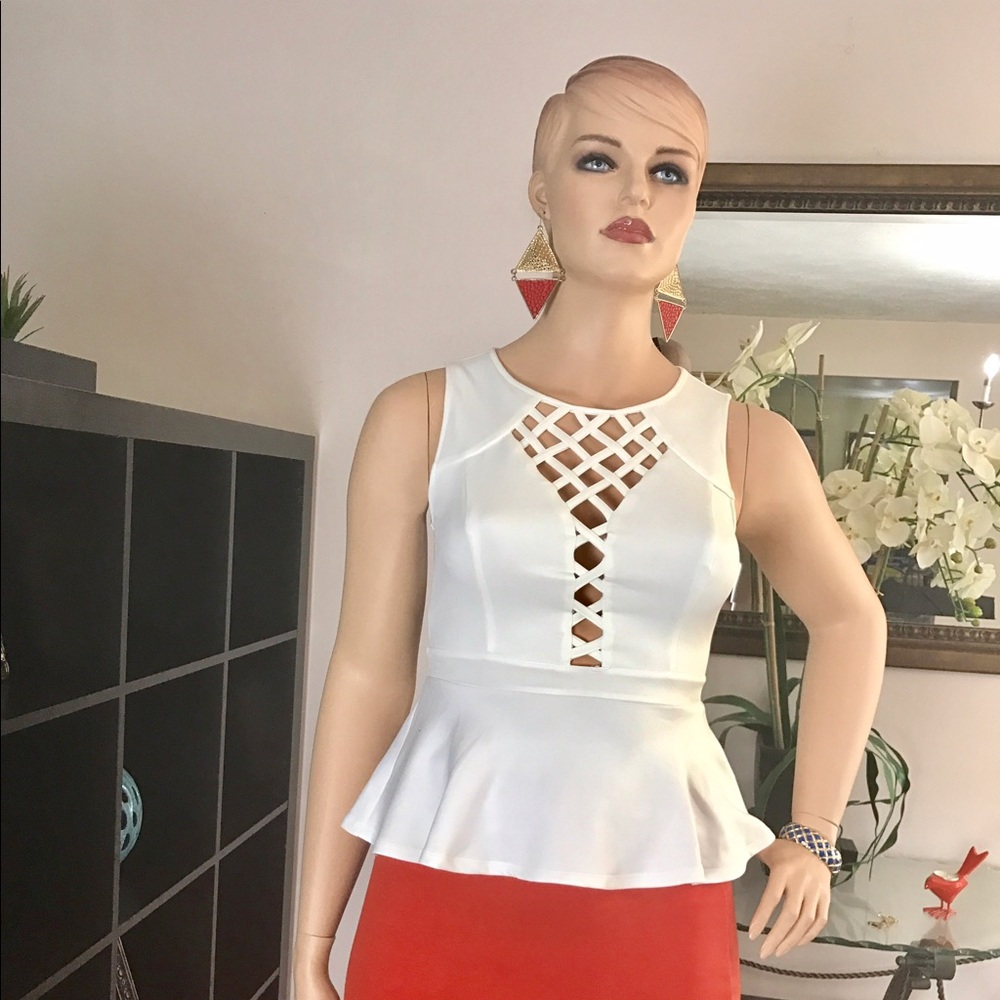 Cute cutout peplum top. Size L