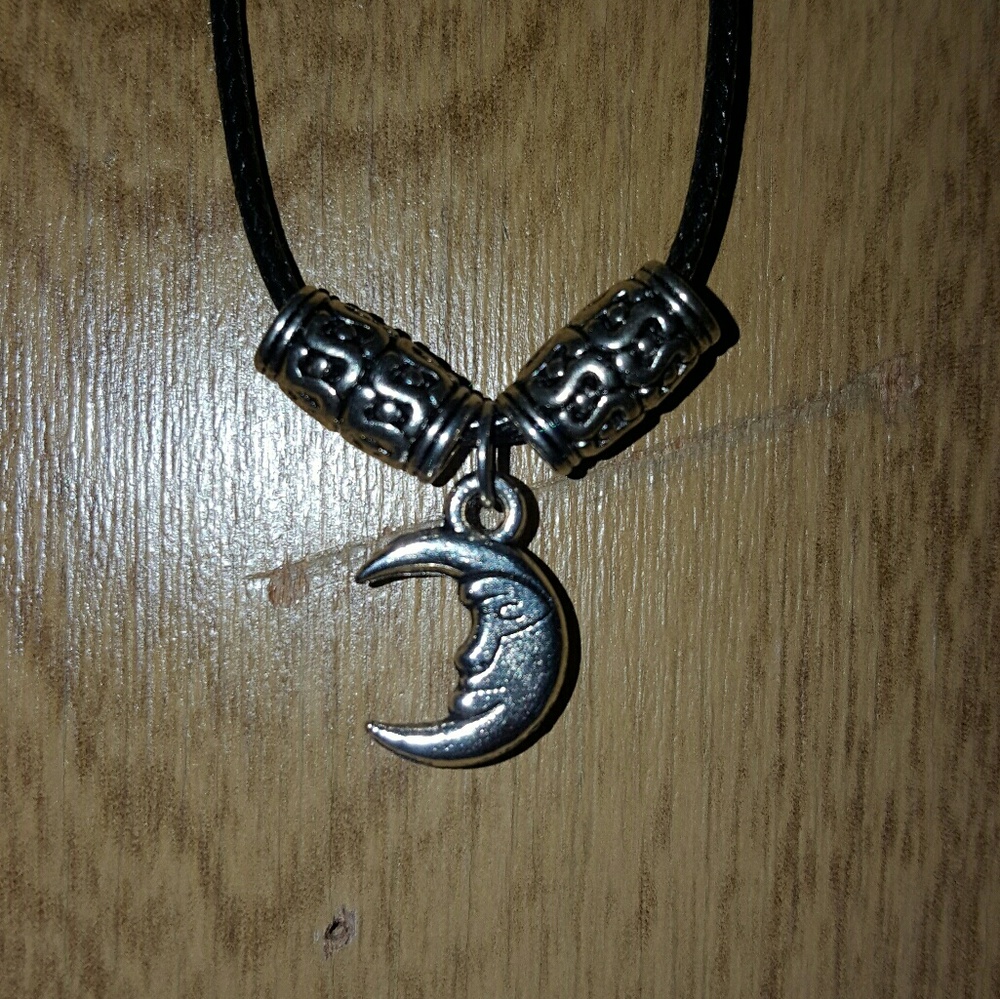 Man in the moon necklace