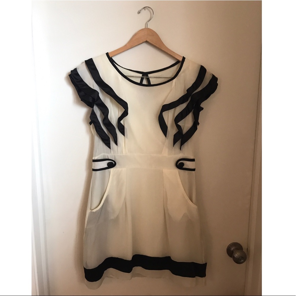 Ivory ruffle dress with black trim sizeL