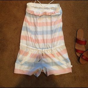 Adidas romper in millennial pink and baby blue.
