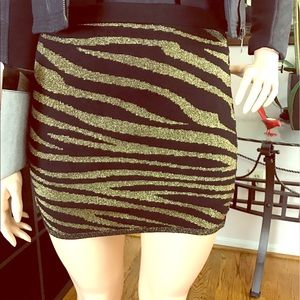 Gold and black zebra print mini skirt. Size M