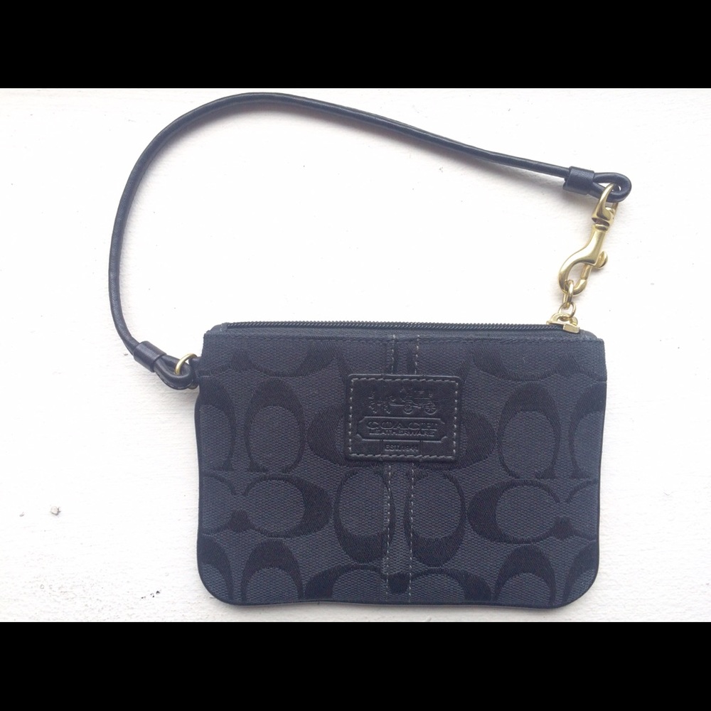 Coach wristlet in signature fabric