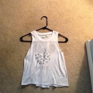 A white and silver Mickey Mouse shirt