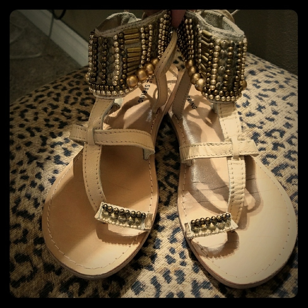 Ankle wrapped Sandals.