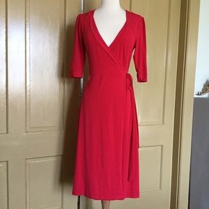 Red Faux wrap around dress size small. Stretchable