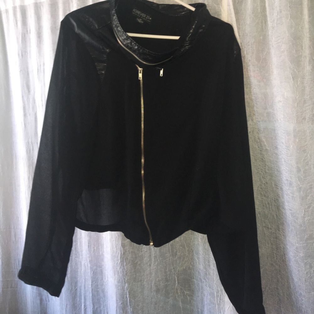 Plus size sheer sleeve jacket.