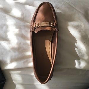 Saddle color leather loafers from Coach.