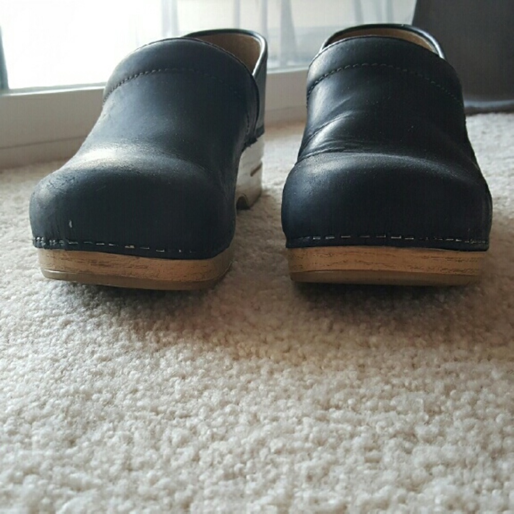 Dansko Blonde clogs in black