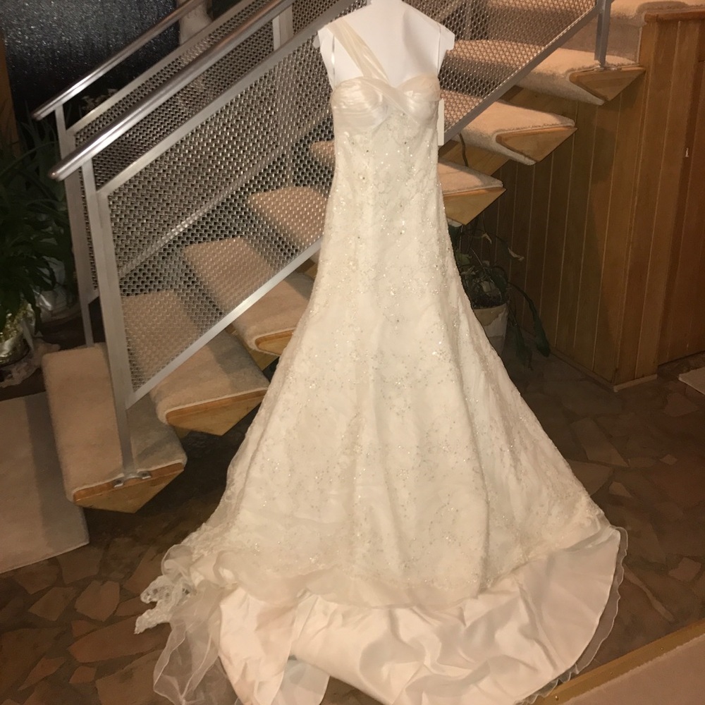 Bridal gown by Brides by Demetrios. Brand new!