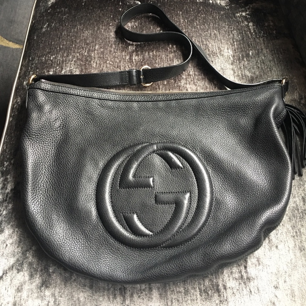 Gucci hobo, natural grain black leather w/ tassel