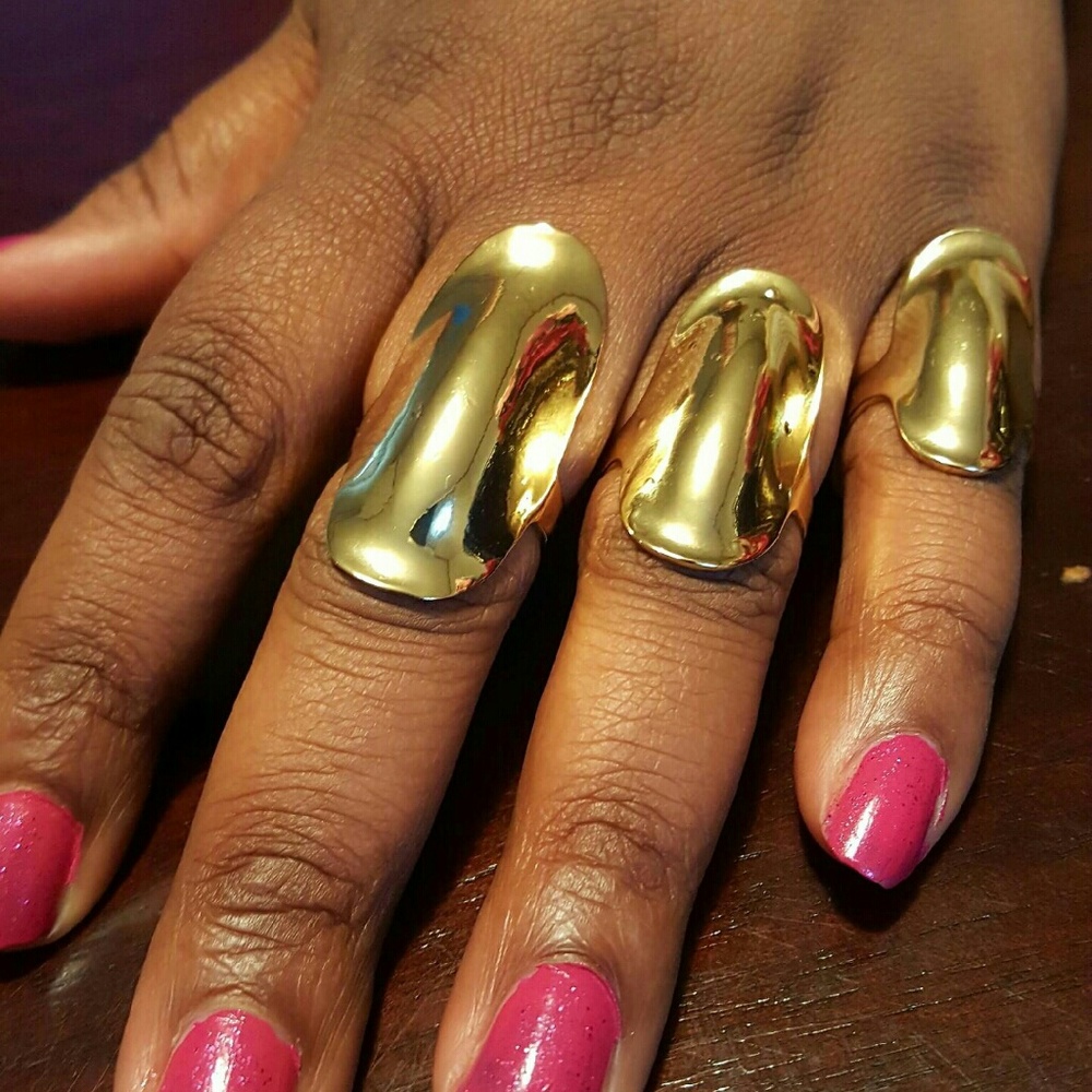 SOLD!!!!7 sets of Golden knuckle rings three piece