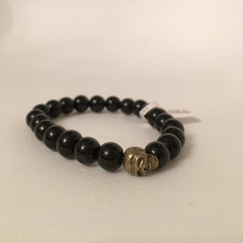 LF black stone and gold skull bracelet