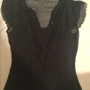 A black button down blouse