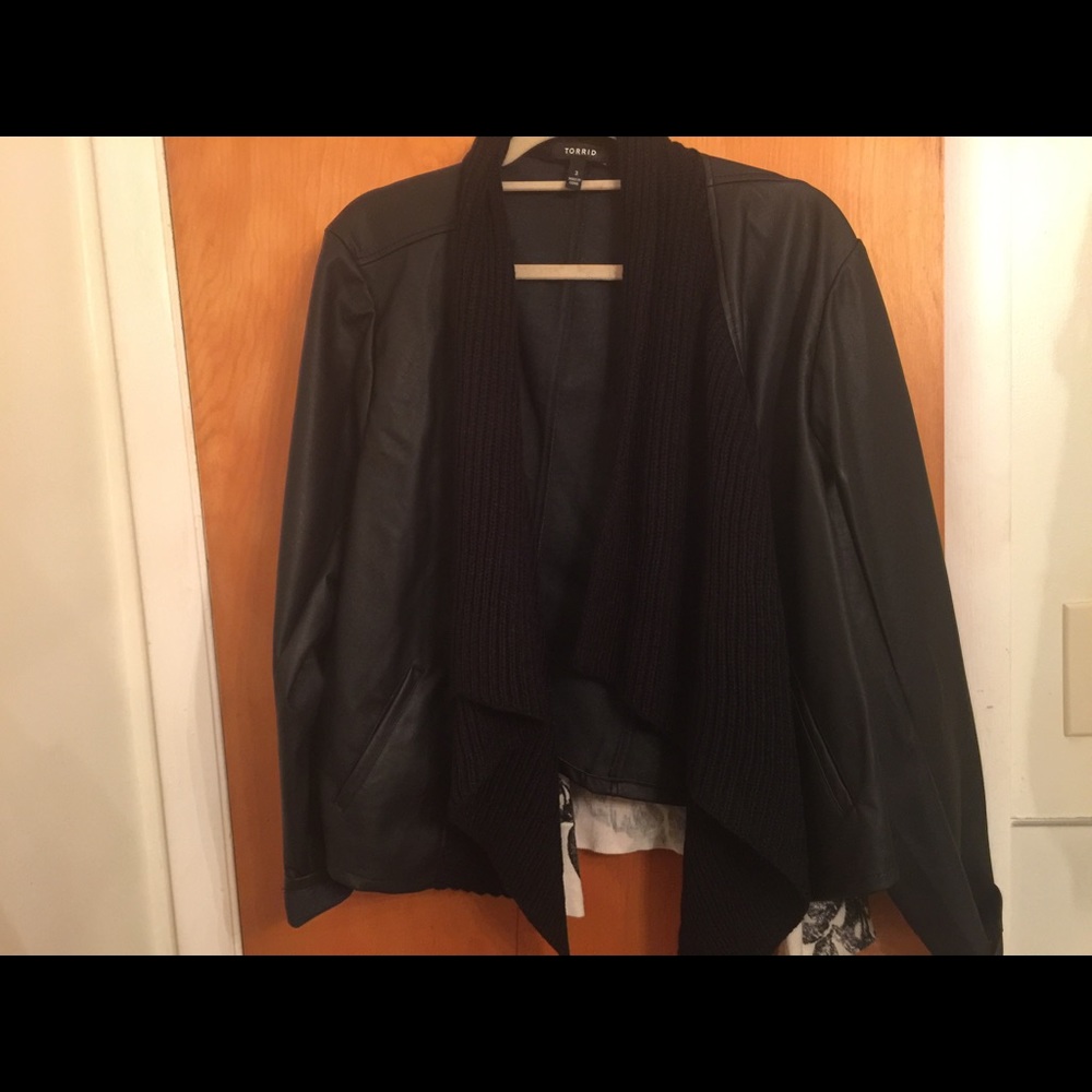 Torrid faux leather with knit collar.