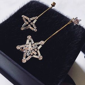 Asymmetrical crystal star earrings