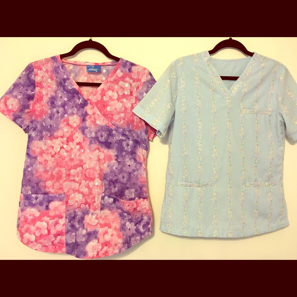 Two very unique embroidered scrub tops size XS
