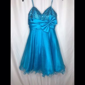Teal sequence dress with bow