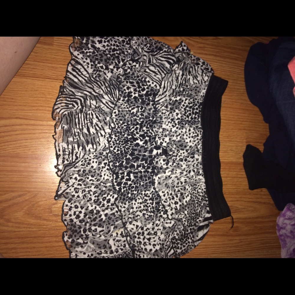 Juniors multi-animal print mini skirt
