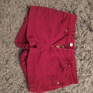 High-waisted, button-up shorts