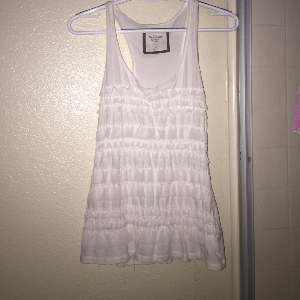 White ruffled tank