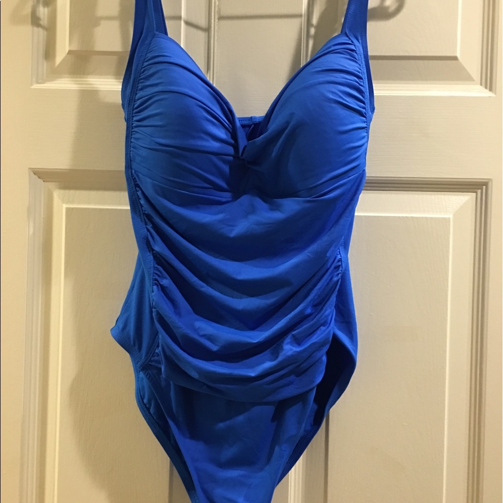Blue one piece swim suit.