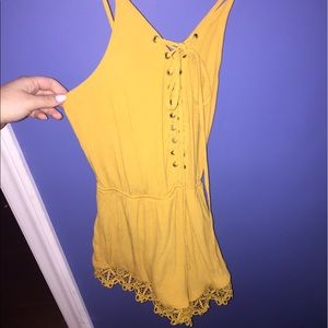 Mustard yellow lace-up romper