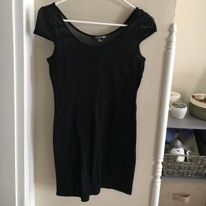 Black mini dress with sheer sleeves