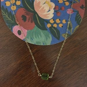 Judith Bright tiny peridot stone necklace