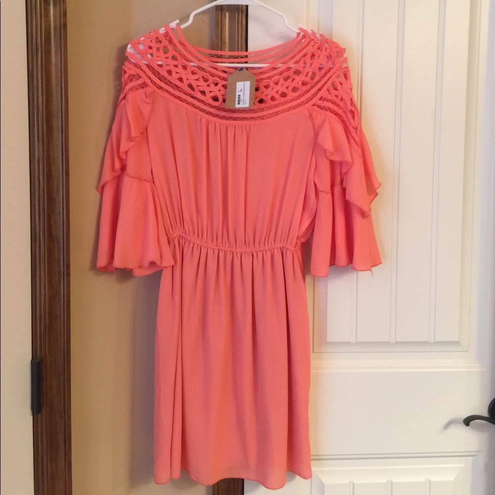 Coral dress size L, never worn.