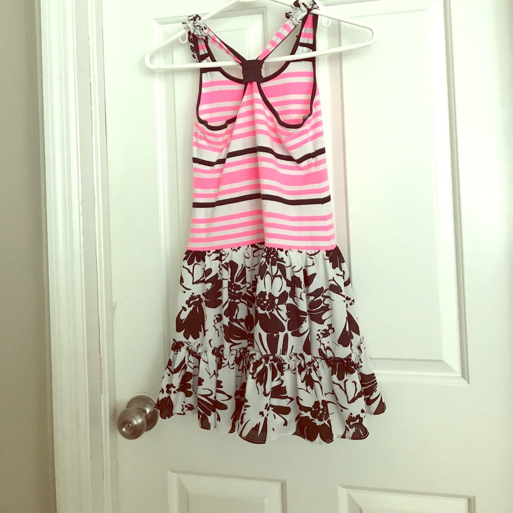 Pink and black topped dress with floral bottom