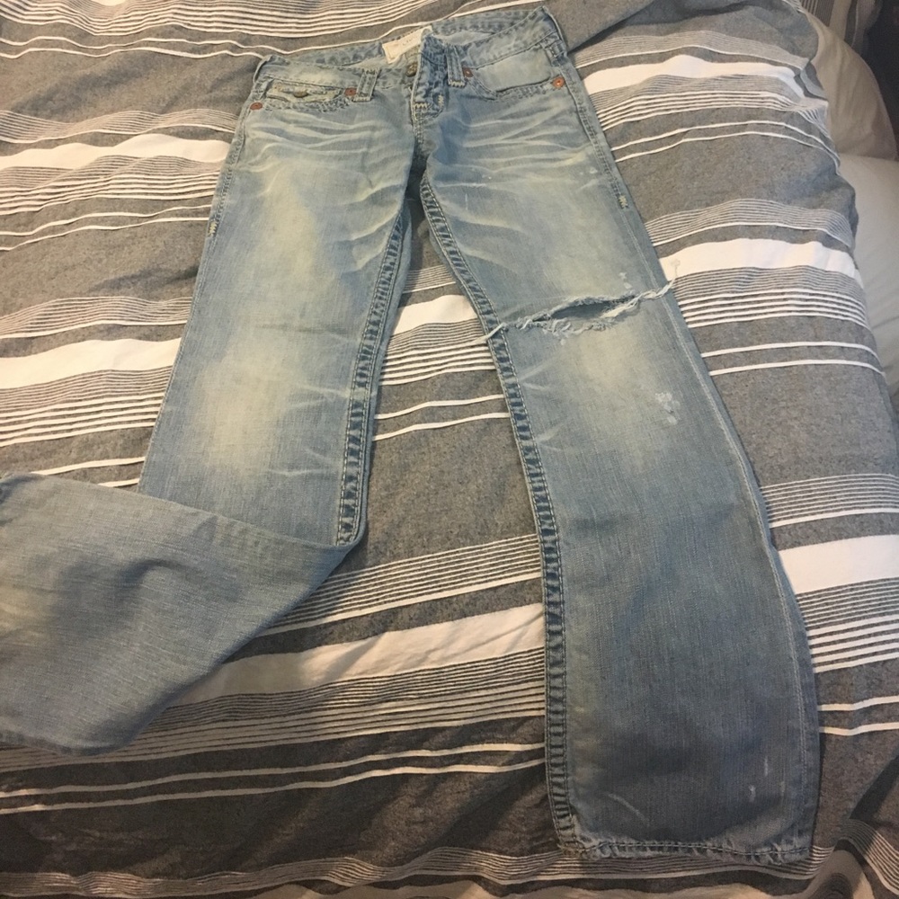 Woman's Big Star worn jeans.