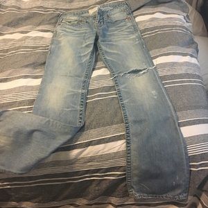 Woman's Big Star worn jeans.