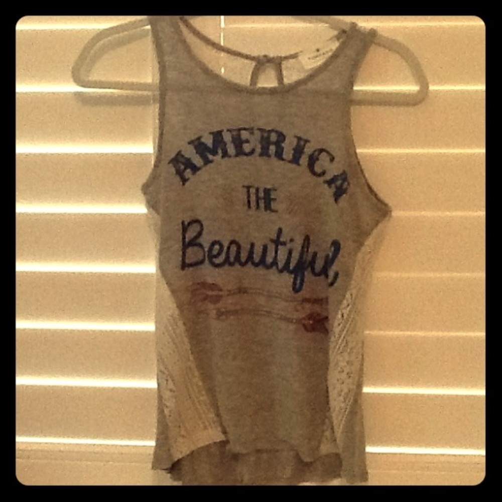 Sleeveless tank top with lace sides and shoulders