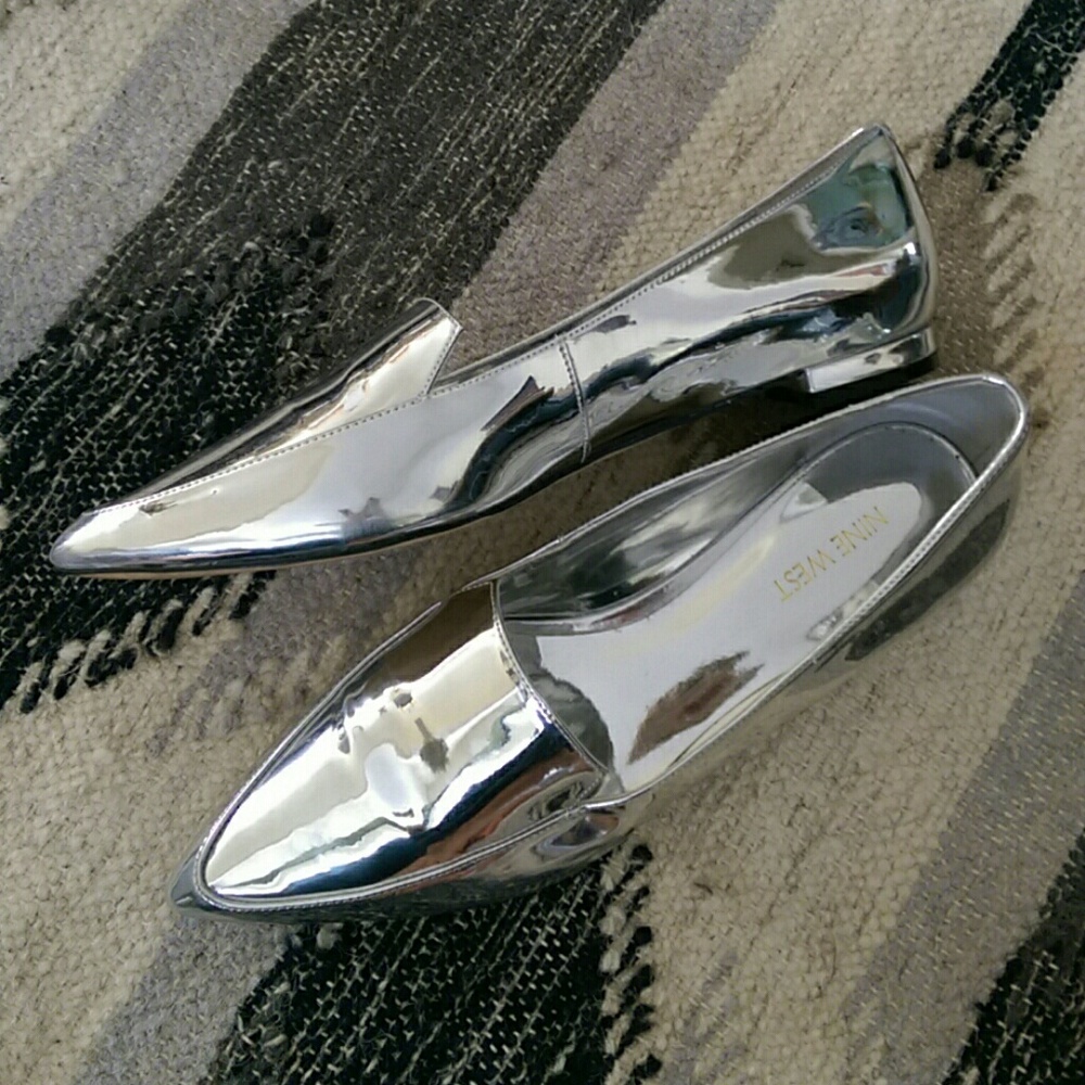 Shiny silver loafers