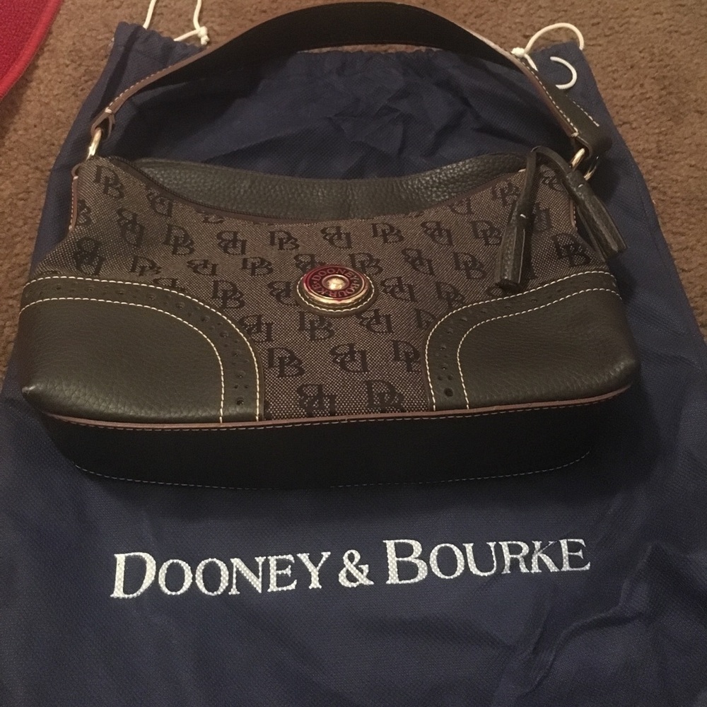 Like new!! Dooney & Bourke brown bag