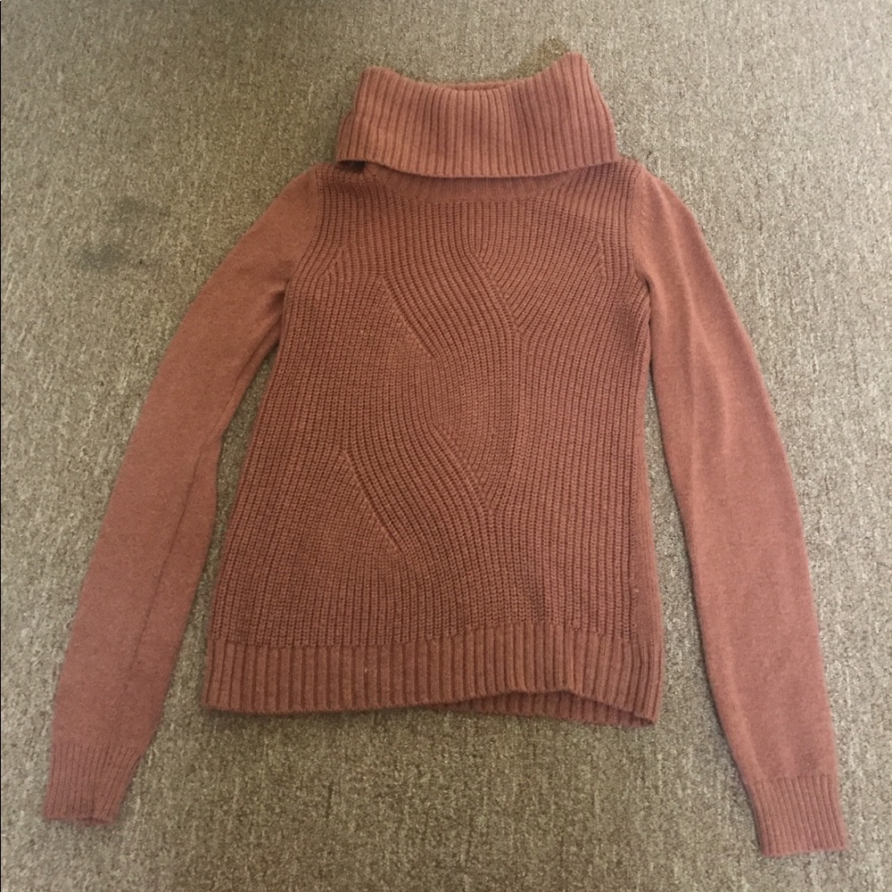 Dusty rust colored turtleneck sweater