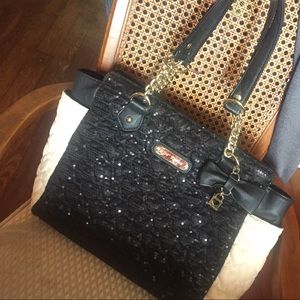 Lightly used Betsy Johnson purse