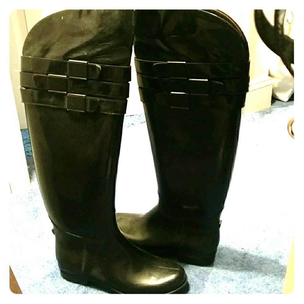 Rubber, rain over the knee boots
